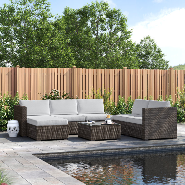 Lark Manor Amarachi 7 Piece Rattan Sectional Seating Group with